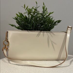 Salvatore Ferragamo Cream Clutch with Gold Hardware